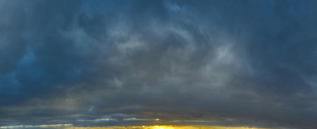 Russia. The South of Western Siberia. Panorama of the evening summer sky with multicolored clouds...