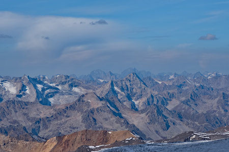 Russia. Kabardino-Balkaria. A dizzying view of the mountain peaks of the Caucasus around Mount Elbrus (5,642 m) - the highest mountain in Russia and Europe.の写真素材
