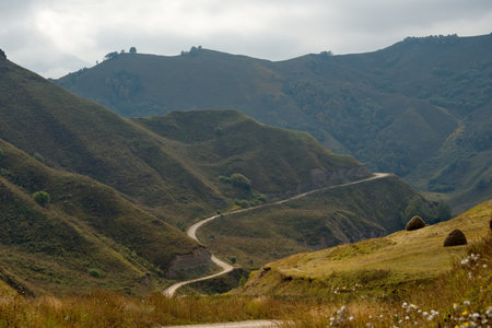 Russia. The North Caucasus. Scenic view of the winding dirt road in the mountains of the Elbrus...