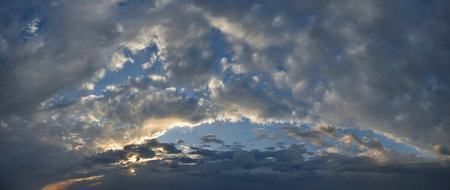 The South of Western Siberia. Panorama of the evening summer sky with multicolored clouds over the...