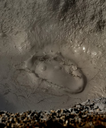 Russia. Kuril Islands. Bizarre mud bubbles bubbling fumaroles at the foot of the dormant volcano...