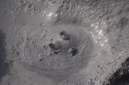 Russia. Kuril Islands. Bizarre mud bubbles bubbling fumaroles at the foot of the dormant volcano...