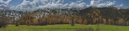 Russia. Western Siberia, Altai Mountains. A fascinating view of the autumn Altai mountains sprinkled with the first snow in the valley of the Chuya River.の写真素材
