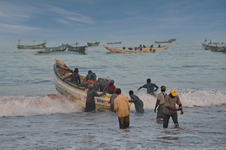 Nouakchott. Mauritania. On October 03, 2021, fishermen go fishing daily on wooden boats with a motor...