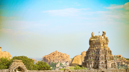 Hampi  Hospet - Karnataka  Hampi forest and rock with big templeの写真素材