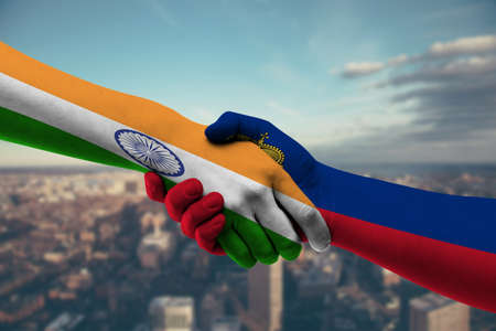 Flag of India and Russia countries, handshake cooperation, partnership and friendship concept