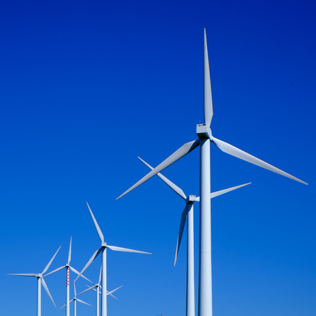 Wind turbine in a blue sky
