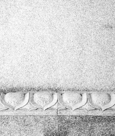 Old plaster walls in the Arts of China has carved lotus.の写真素材
