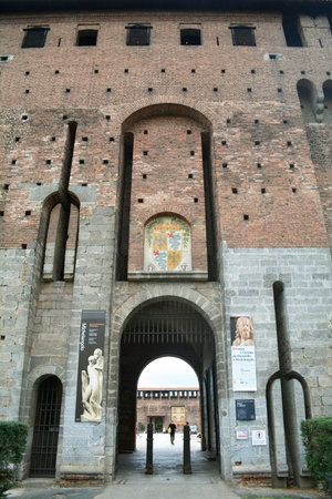 Milan, Italy, October 2021: One of the four entrances gates to Sforza's Castle (Castello Sforzesco) with House of Sforza coat of arms engraved above it.のeditorial素材
