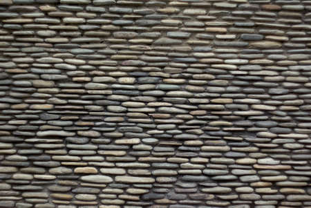 Old stone wall texture backgroundの写真素材