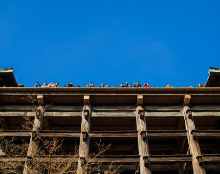 KYOTO, JAPAN DECEMBER 9, 2016: Tourists visit Kiyomizu-dera temple on 9 December, 2016. Kiyomizu-dera temple is part of the Historic Monuments of Ancient Kyoto.のeditorial素材