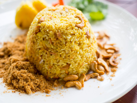 Fried rice with Cashews nuts on plateの写真素材