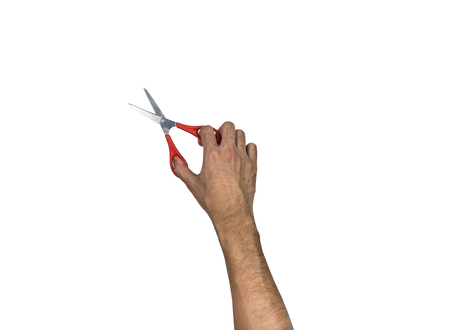 Hand holding scissor making cut action,isolated on white background, clipping pathの写真素材