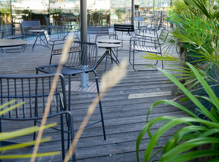 Tables setting outdoor at restaurantの写真素材