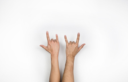 Two love sign, hand gesture on white backgroundの写真素材
