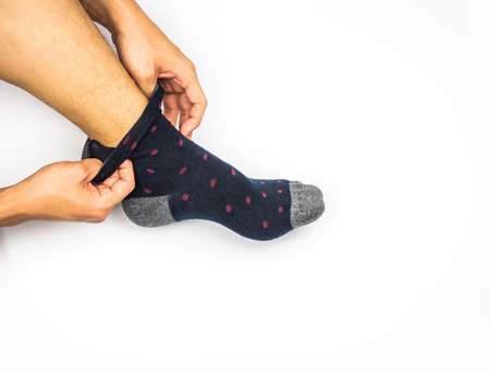 Take off sock on white backgroundの写真素材