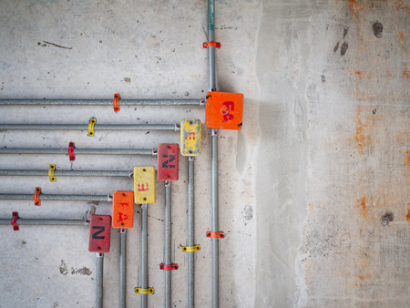 Water pipes inside the building wallの写真素材