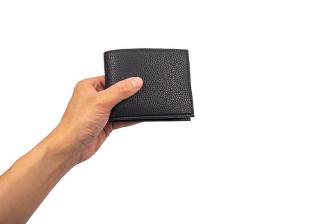 à¹Black leather wallet with hand holding isolated on white backgroundの写真素材