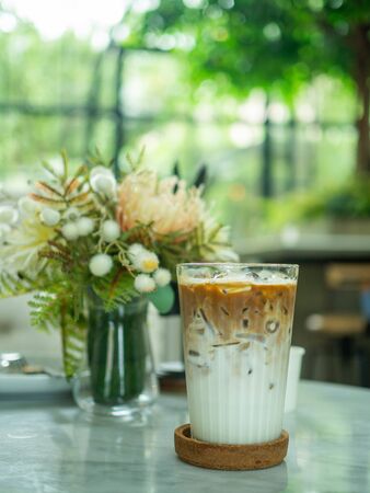 Iced latte coffee in cafeの写真素材