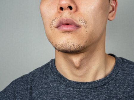 Asian man beard or facial hair - close up shotの写真素材