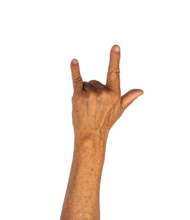 Rock sign senior hand gesture isolated on white backgroundの写真素材