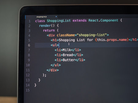 React coding on computer laptop screen close upの写真素材
