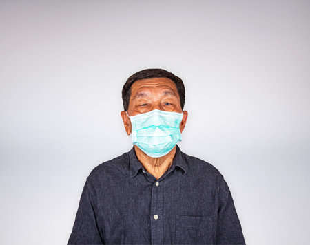 Asian Senior man wearing medical facial maskの写真素材