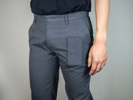 Phone bulge inside trousers on man close upの写真素材