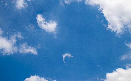 Blue sky with cloudsの写真素材