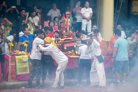 Hatyai, Songkhla, Thailand - Oct. 6, 2016 :  People celebrate a vegetarian festival during the festival ritual mortification is practised to appease the Gods.Action photography Capturing movement.のeditorial素材