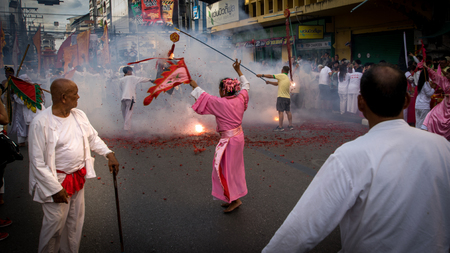 Hatyai, Songkhla, Thailand - Oct. 6, 2016 :  People celebrate a vegetarian festival during the festival ritual mortification is practised to appease the Gods.Action photography Capturing movement.のeditorial素材