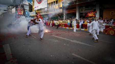 Hatyai, Songkhla, Thailand - Oct. 6, 2016 :  People celebrate a vegetarian festival during the festival ritual mortification is practised to appease the Gods.Action photography Capturing movement.のeditorial素材