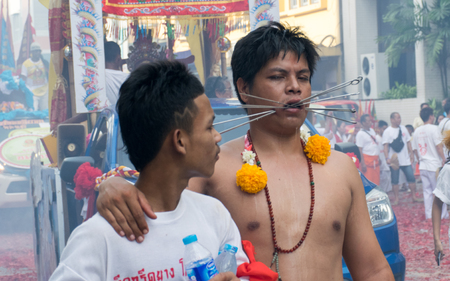 Hatyai, Songkhla, Thailand - Oct. 6, 2016 :  People celebrate a vegetarian festival during the festival ritual mortification is practised to appease the Gods.Action photography Capturing movement.のeditorial素材