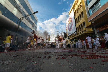 Hatyai, Songkhla, Thailand - Oct. 6, 2016 :  People celebrate a vegetarian festival during the festival ritual mortification is practised to appease the Gods.Action photography Capturing movement.のeditorial素材