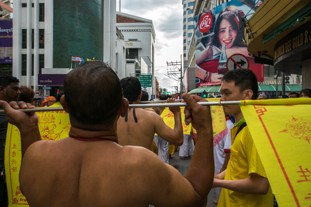 Hatyai, Songkhla, Thailand - Oct. 7, 2016 :  People celebrate a vegetarian festival during the festival ritual mortification is practised to appease the Gods.Action photography Capturing movement.のeditorial素材