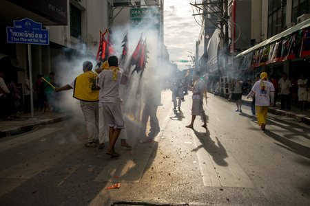 Hatyai, Songkhla, Thailand - Oct. 7, 2016 :  People celebrate a vegetarian festival during the festival ritual mortification is practised to appease the Gods.Action photography Capturing movement.のeditorial素材