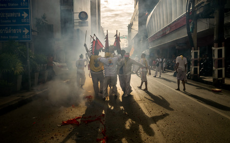 Hatyai, Songkhla, Thailand - Oct. 7, 2016 :  People celebrate a vegetarian festival during the festival ritual mortification is practised to appease the Gods.Action photography Capturing movement.のeditorial素材
