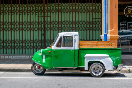 Songkhla, Thailand Mar, 10, 2016 : Vintage motor-tricycle (Tuk Tuk)  parked on the roadside.