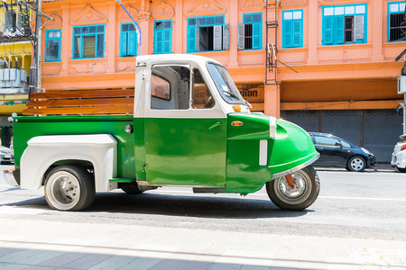 Songkhla, Thailand Mar, 10, 2016 : Vintage motor-tricycle (Tuk Tuk)  parked on the roadside.の写真素材