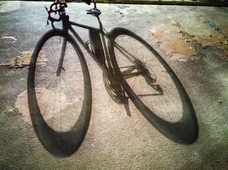 Shadow of the bicycleの写真素材