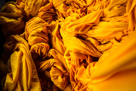 Closeup of lines in yellow fabricの写真素材