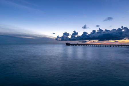 Old stone bridge  into the sea.の写真素材