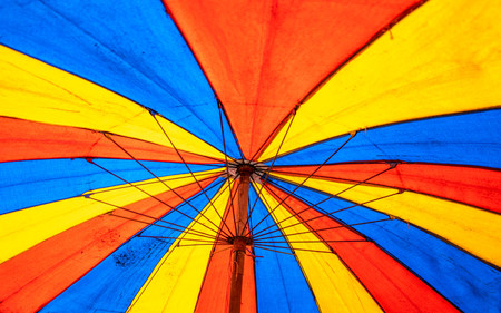 Close up of Under the old paint canvas umbrellaの写真素材