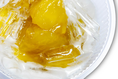 Thai food dessert : Sweet cassava  in syrup with coconut milk and ice.の写真素材