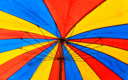 Close up of Under the old paint canvas umbrellaの写真素材