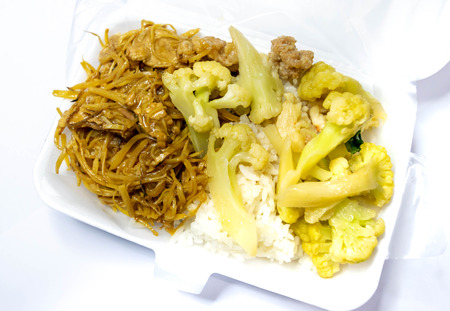 stir-fried cauliflower with prawn and stir-fried pork  with slice ginger on plain rice in foam boxの写真素材