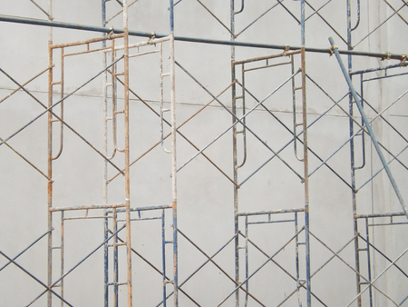 scaffolding in the construction with concrete wallの写真素材