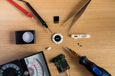 Flatlay repair mp3 player on the tableの写真素材