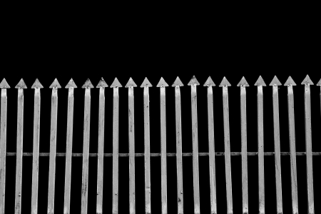 metal bars with black background の写真素材
