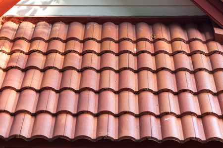 Red tiles roof background